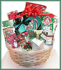 Large Shaker Basket - tri-color tortilla chips, black bean dip, Godiva cocoa, chocolate caramel popcorn, Puff candy, Christmas cake, chocolate covered pretzel logs, large box of Godiva chocolates, taffy, napkins festive